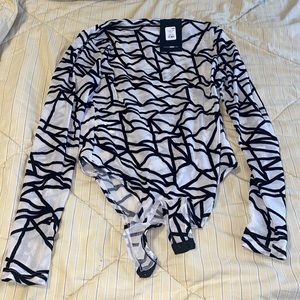 “Heartless mesh bodysuit”